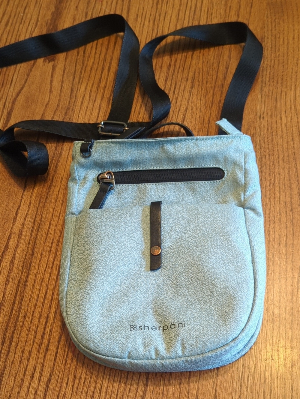 Sherpani Light Blue Crossbody Lima Purse with Black Strap